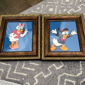 Pair of Disney Donald and Daisy Duck latch hook embroidered art.